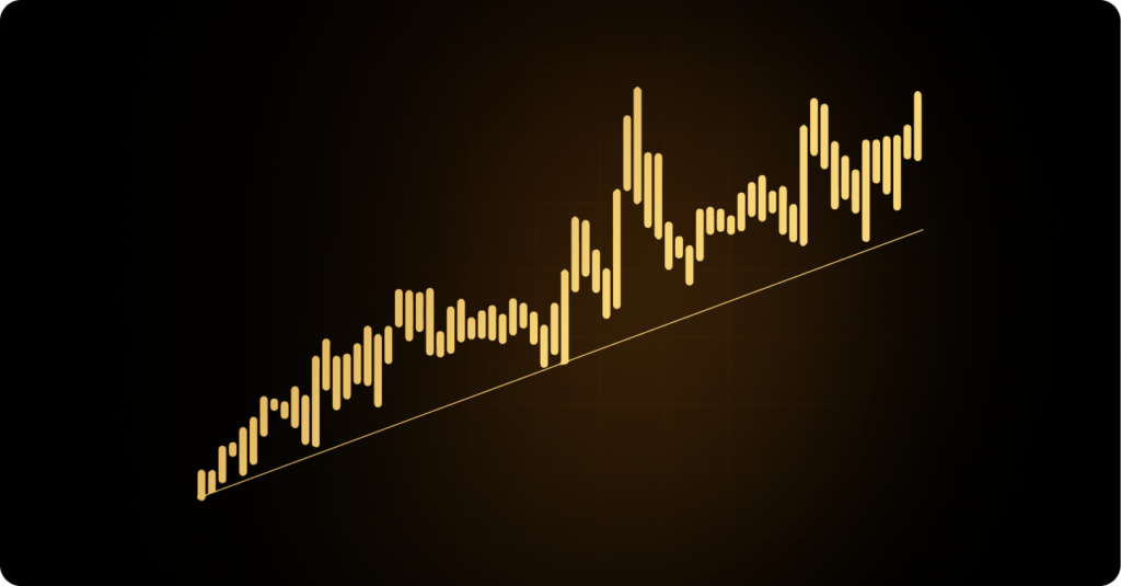 A gold line graph on a black background representing a trend trading strategy, showcasing financial trends and insights.